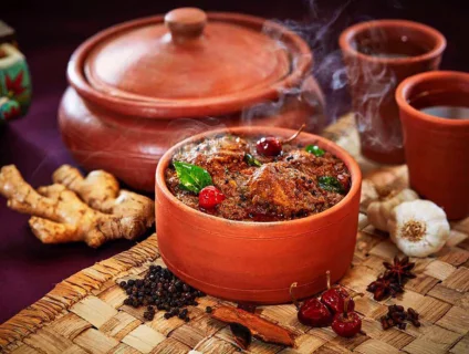 Delicious mutton chukka cooked in a clay pot with a spice mixture that highlights Indian culture.