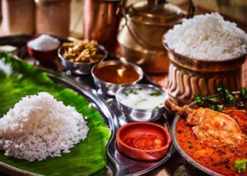An amazing spread of Indian cuisine, showcasing savory dishes, aromatic rice, and fiery curries